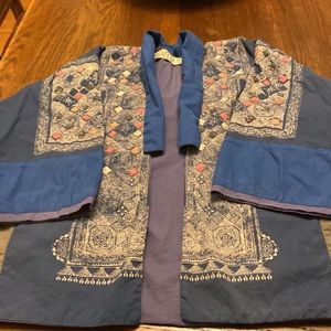 This is a Magnolia Pearl kimono style jacket. Hand quilted color dots.